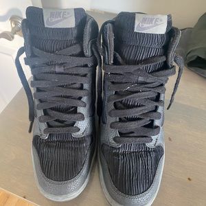 Nike High Tops , very few visible signs of wear. Size 8.5